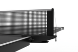 Close-up of a ping pong table net on a white background
