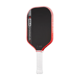 Pickleball paddle with black surface, red edges, and white handle on a white background